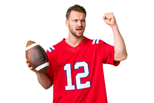 Young caucasian man playing rugby over isolated chroma key background celebrating a victory