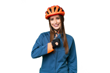 Young cyclist woman over isolated chroma key background giving a thumbs up gesture