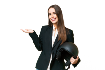 Young Asian woman with a motorcycle helmet over isolated chroma key background extending hands to the side for inviting to come