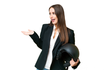Young Asian woman with a motorcycle helmet over isolated chroma key background with surprise expression while looking side