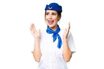 Airplane stewardess over isolated chroma key background with surprise facial expression
