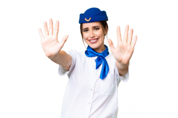 Airplane stewardess over isolated chroma key background counting ten with fingers