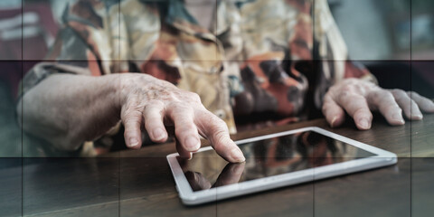 Old woman using a tablet, geometric pattern