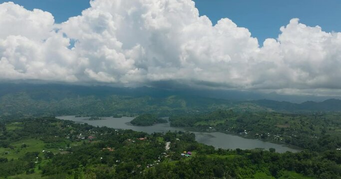 Lake Sebu and farmland under blue sky and clouds. Mindanao, Philippines.