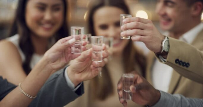 Party, hands and friends toast at a night club for celebration, fun or freedom, happy or excited. Clubbing, cheers and people at event with alcohol, drink or tequila , freedom or birthday reunion