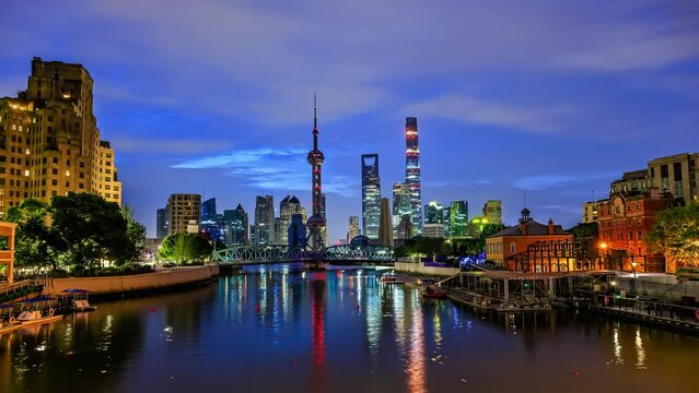 Shanghai skyline and modern buildings scenery at night, China. Famous city landmarks in China. Fixed camera shooting.