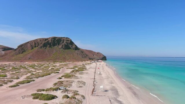 Mexico, La Paz: Aerial view of Tecolote Beach (Playa El Tecolote) with clear turquoise waters of Gulf of California - landscape panorama of Latin America from above