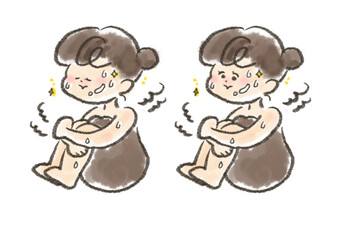 サウナで体育座りをする女性