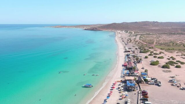 Mexico, La Paz: Aerial view of Tecolote Beach (Playa El Tecolote) with clear turquoise waters of Gulf of California - landscape panorama of Latin America from above