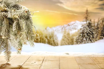 Zelfklevend Fotobehang Wooden table of free space for your decoration. Winter snow and frost. empty space for your products. Magic christmas time. Mockup background and cold december day.  © magdal3na
