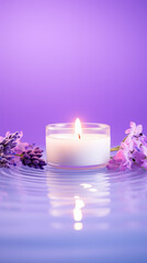 Obraz na płótnie Canvas A lit candle in a glass jar on a reflective water surface with tiny ripples. The background is a gradient of purple and pink. The jar is surrounded by purple lavender flowers. 