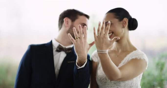 Couple, smile and wedding ring for commitment, love and outdoors or promise and loyalty in marriage. Newlyweds, jewelry and faith or trust in relationship, hope and partnership in portrait of support