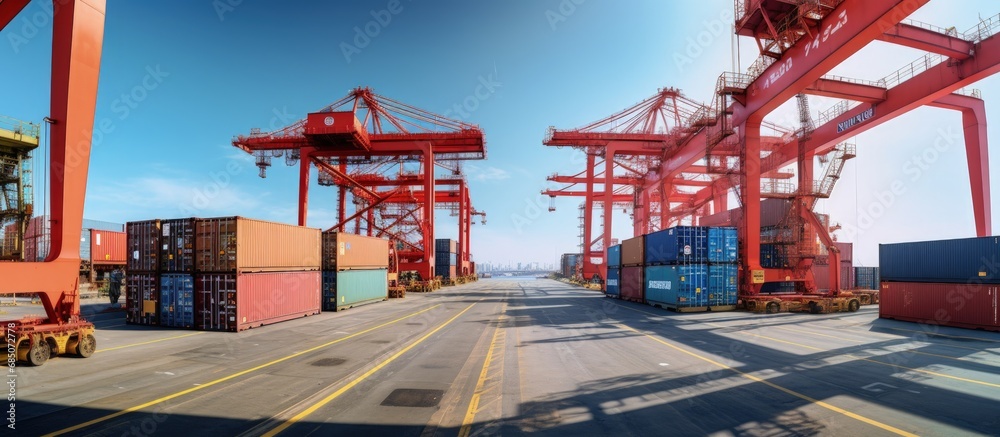 Poster gantry crane moves containers from storage to ship bay using a fish eye lens copy space image