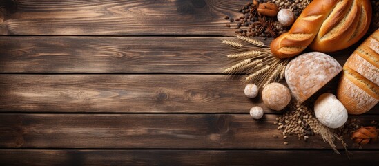 Naklejka premium Freshly baked bread on a wooden table with a variety of bakery goods copy space image