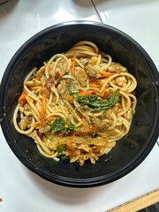 stir fried spaghetti with Clams and Thai basil
