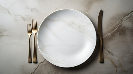 White plate shaker wine glass and cutlery on stone