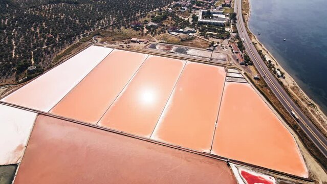 Evaporation salt pans in saltworks in Turkiye. Aerial view of Salt fields. Stone Salt Works