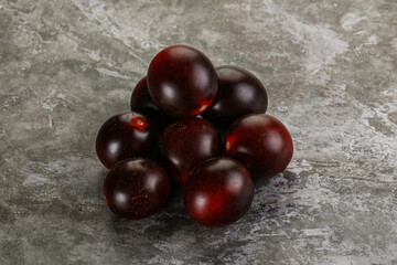 Raw ripe black kumato tomato