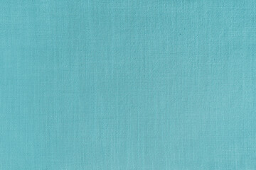 Texture background of cyan linen fabric. Textile structure, cloth surface, weaving of natural...