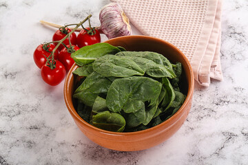 Green spinach leaves in the bowl