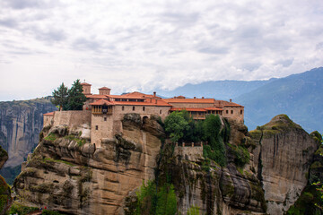Fototapeta na wymiar Monastery on cliff in Meteora, Thessaly Greece. Greek destinations