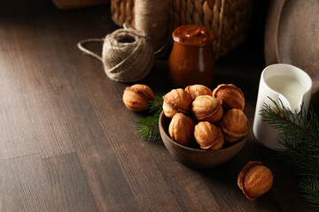 Cookies Nuts in a bowl with a sprig of needles