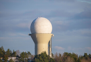 Radar dome on a hill at a local airport in Bromma, a winter day in Stockholm Sweden