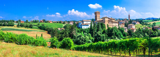 Romantic vine route with medieval castles in Italy. Emilia Romagna region, Levizzano castle and scenic village - 685106137