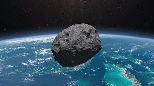 An asteroid falls to Earth. Dangerous approach of an asteroid to planet Earth. Asteroid or meteorite and Earth. 4k video. Elements of this video furnished by NASA. 
