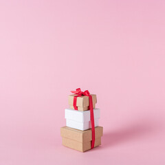 Creative layout of gift boxes on pink background. Minimal sale c
