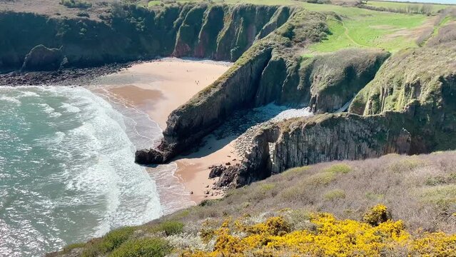 Looking down into Skrinkle Haven Beach near Lydstep Tenby Pembrokeshire Wales