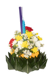 krathong with incense sticks and candles Isolated on white background.