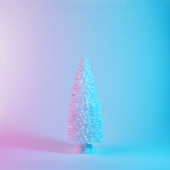 White Christmas tree in vibrant bold gradient holographic colors. Christmas and New Year minimal art concept.