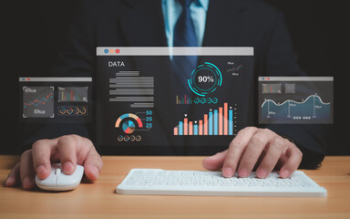 Business people use computers to analyze business and manage corporate data, business analytics...