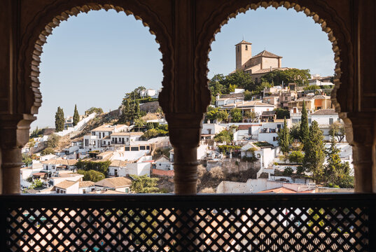 Townscape seen through Generalife windows in Spain on sunny day