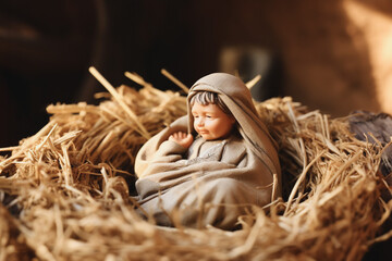 Figurine of baby born christ nativity scene - obrazy, fototapety, plakaty