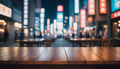 The empty wooden table top with blur background of japan night city - obrazy, fototapety, plakaty