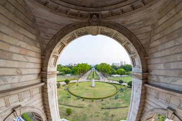 View of The famous Victoria Memorial with Garden, a large marble building in Central Kolkata, at the time of Sunrise.