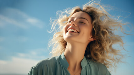 A Blonde woman breathes calmly looking up isolated on clear blue sky - obrazy, fototapety, plakaty