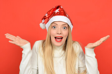 very happy young woman in santa hat