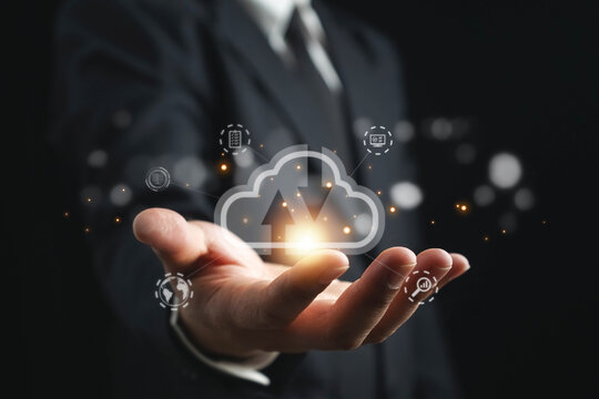 Businessman showing to virtual artificial intelligence with cloud computing technology transformation and internet of thing. Cloud technology management big data include business strategy.Data storage