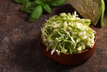 fresh cabbage salad coleslaw on wooden table