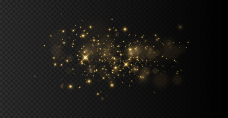 The light of gold dust, bokeh light effect background. Christmas glowing dust background, Yellow flickering glow with confetti bokeh light and particle motion. The dust sparks and golden stars shine.