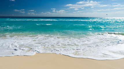 Fototapeta na wymiar Cancun beach with white sand and blue waves