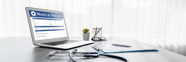 Detailed medical report on laptop for diagnosing illness and effective healthcare treatment plan...