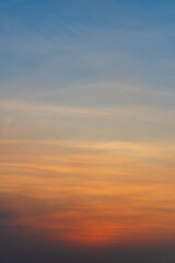 Orange and blue sunset sky gradient, copy space background. Red evening sky.