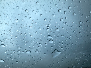 water droplets on glass,rainfall and creative concept