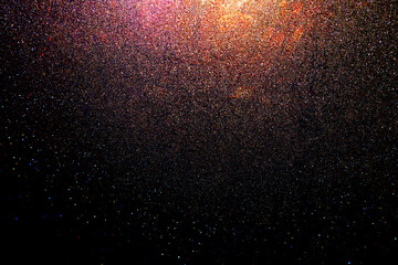 Black dark purple orange  golden red brown shiny glitter abstract background with space. Twinkling...