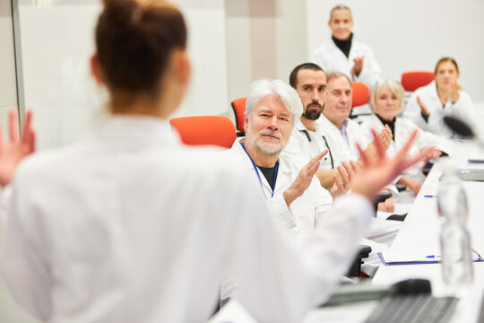 Doctors panel discussing during medical conference at auditorium - Powered by Adobe