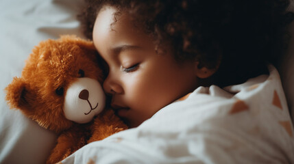 Child Sleeping Peacefully with Cuddly Teddy Bear in Cozy Bedroom Environment - obrazy, fototapety, plakaty